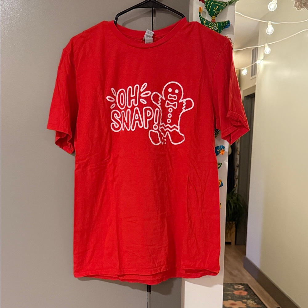 Christmas T-shirt featuring a gingerbread man graphic Oh Snap! Size Medium